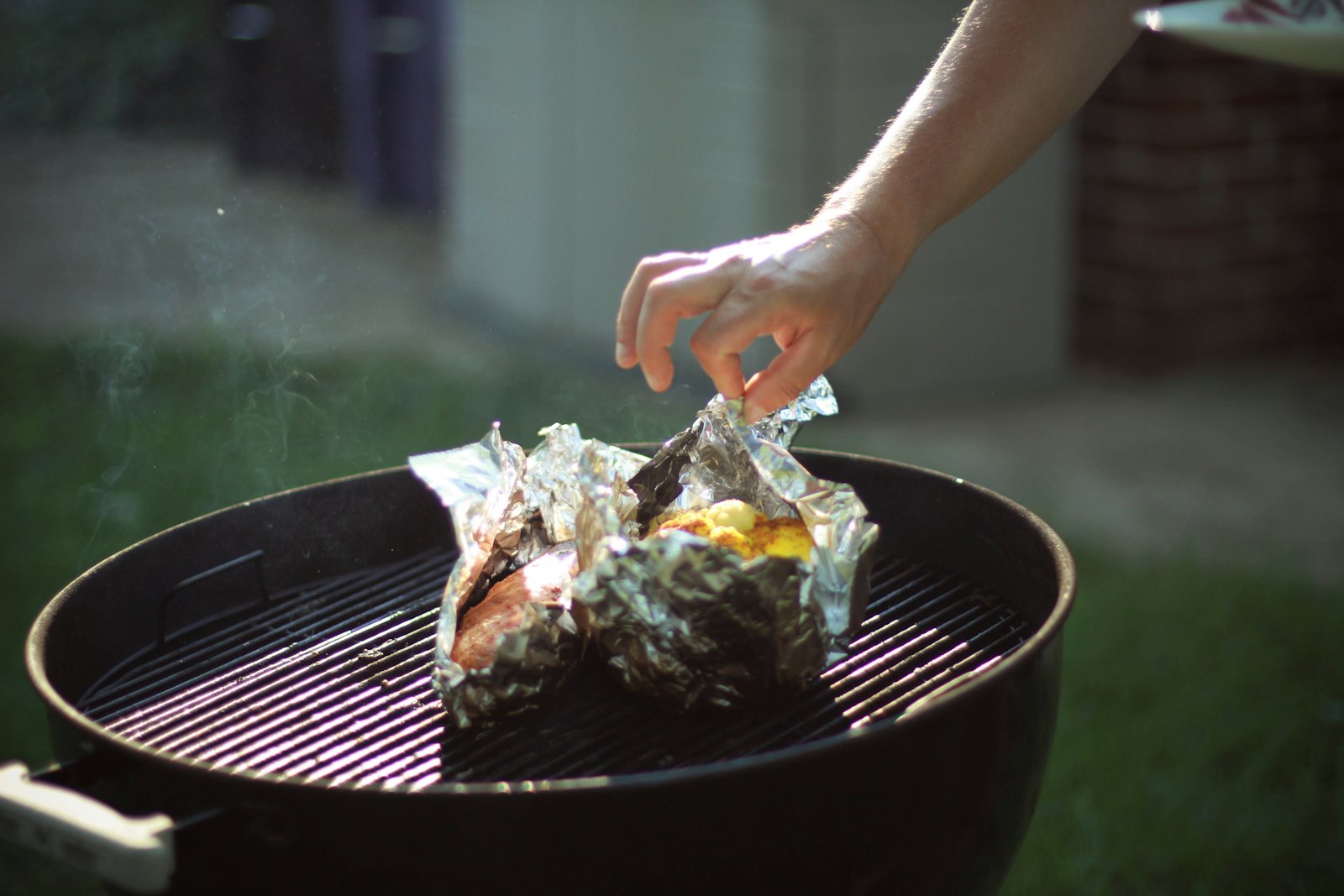 A grill pan over fire, the tradeoff the one pan summer method works around